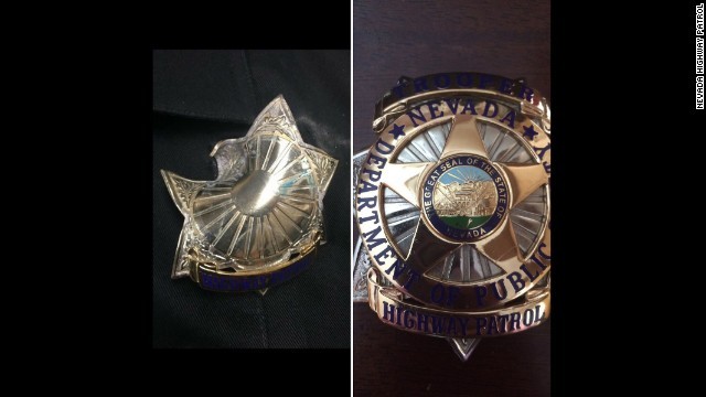 officer-saved-by-badge